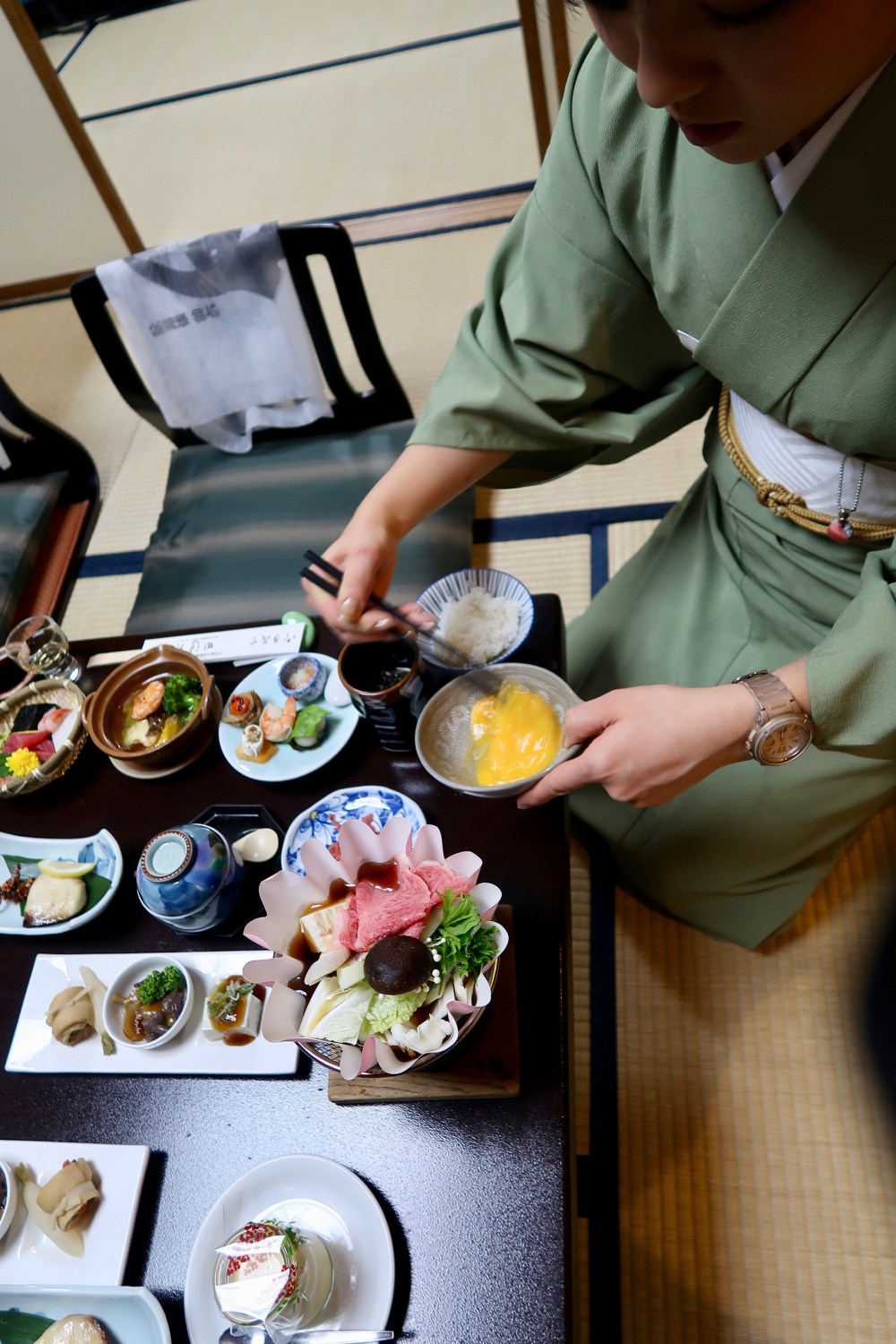 The lovely waitress makes sure we know what we are doing...